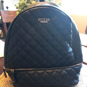Black quilted Guess backpack,